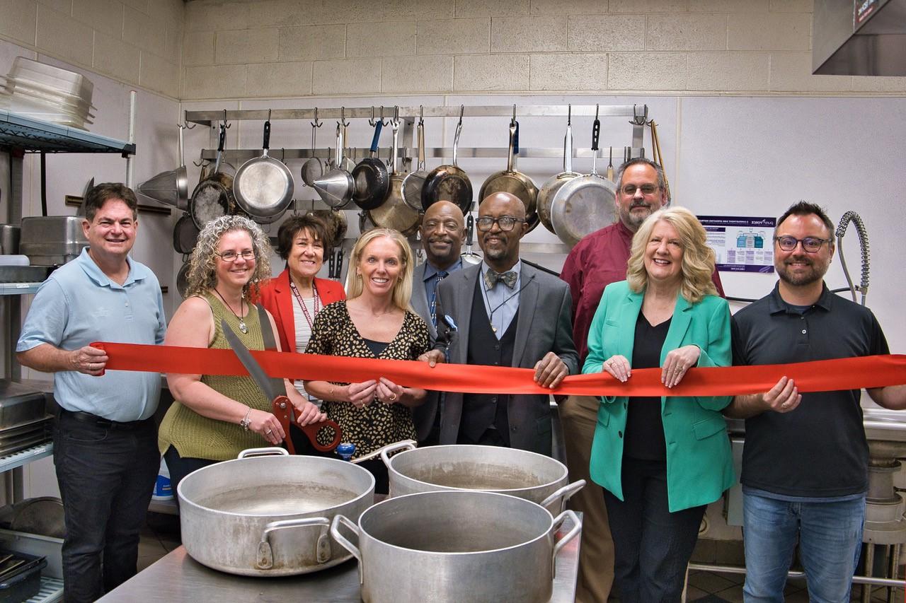 group photo ribbon cutting ymca mccc